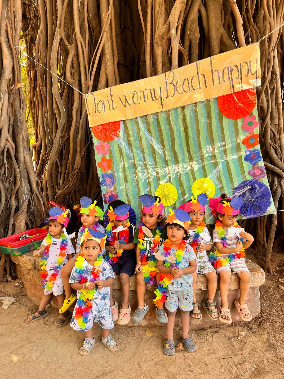 Children at a beach-themed celebration outdoors