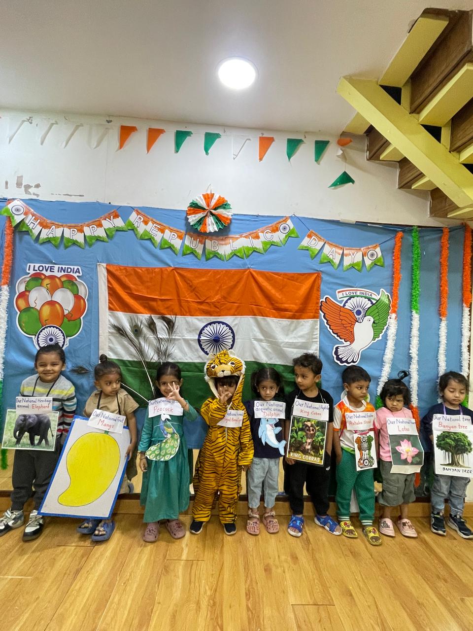 Children presenting India's national symbols on Republic Day
